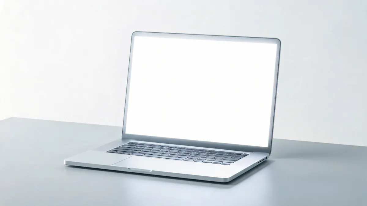 MacBook mostrando un tinte blanco pálido sobre toda la pantalla, mostrando el efecto de saturación faltante causado por Night Shift o un perfil de color corrupto