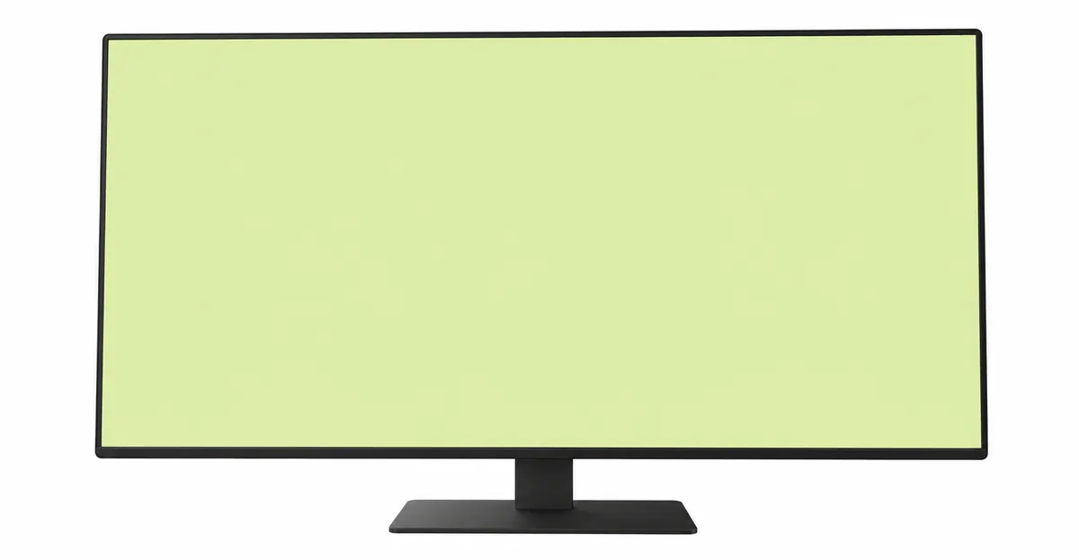 Modern widescreen LCD computer monitor showing a solid pale dusty yellow-green color filling the entire display area edge to edge, indicating a uniform green color tint affecting the whole screen